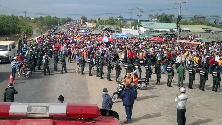 Striking garment workers protest in Bavet in December. AFP Striking garment workers protest in Bavet in December. AFP