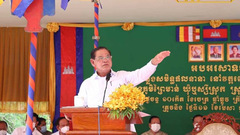 Interior minister Sar Kheng addresses the public at a pagoda on April 11. SAR KHENG VIA FACEBOOK Content image - Phnom Penh Post