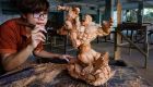 Young carver adds modern dimension to traditional art